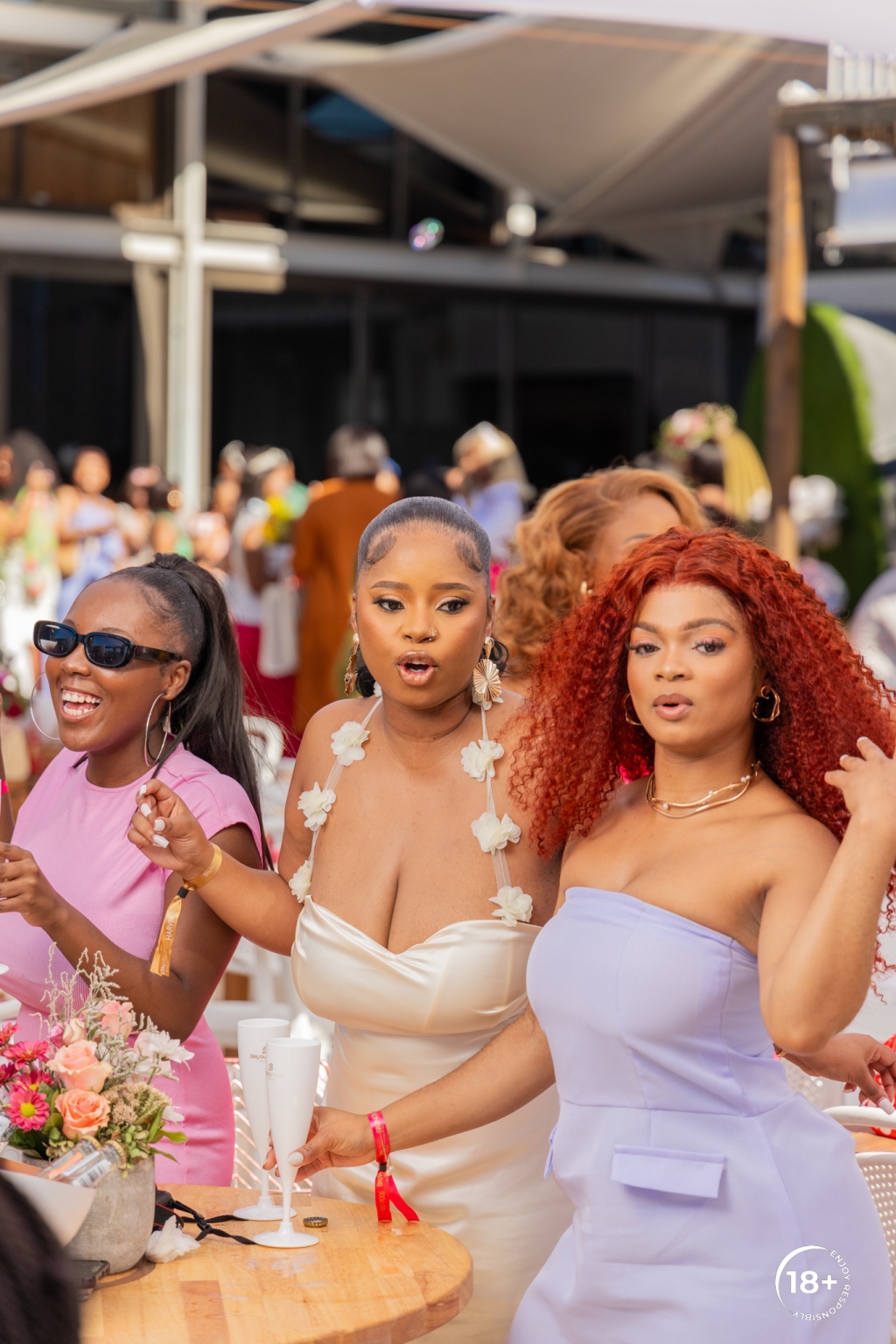 Guests enjoying the lively ambiance of Brutal Fruit's Spritzer Saturday Brunch, surrounded by friends, music, and refreshing drinks, embodying the spirit of South African celebration.